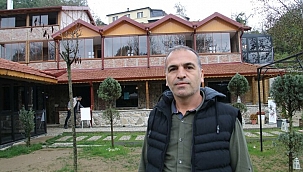 İnşaatlardan artan malzemelerle butik otel yaptı