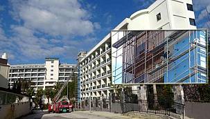 Yurdum insanı! 5 yıldızlı oteldeki yangını umursamayıp otelin cephesinde sıva yapmaya devam etti