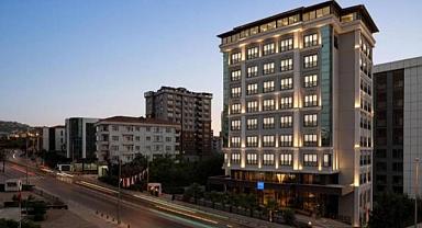 Saspa Turizm Yapı Kayıt Belgesi ile çatı katı eklenen binayı otele dönüştürüyor!